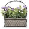 Purple Flower Arrangement In Wire Basket